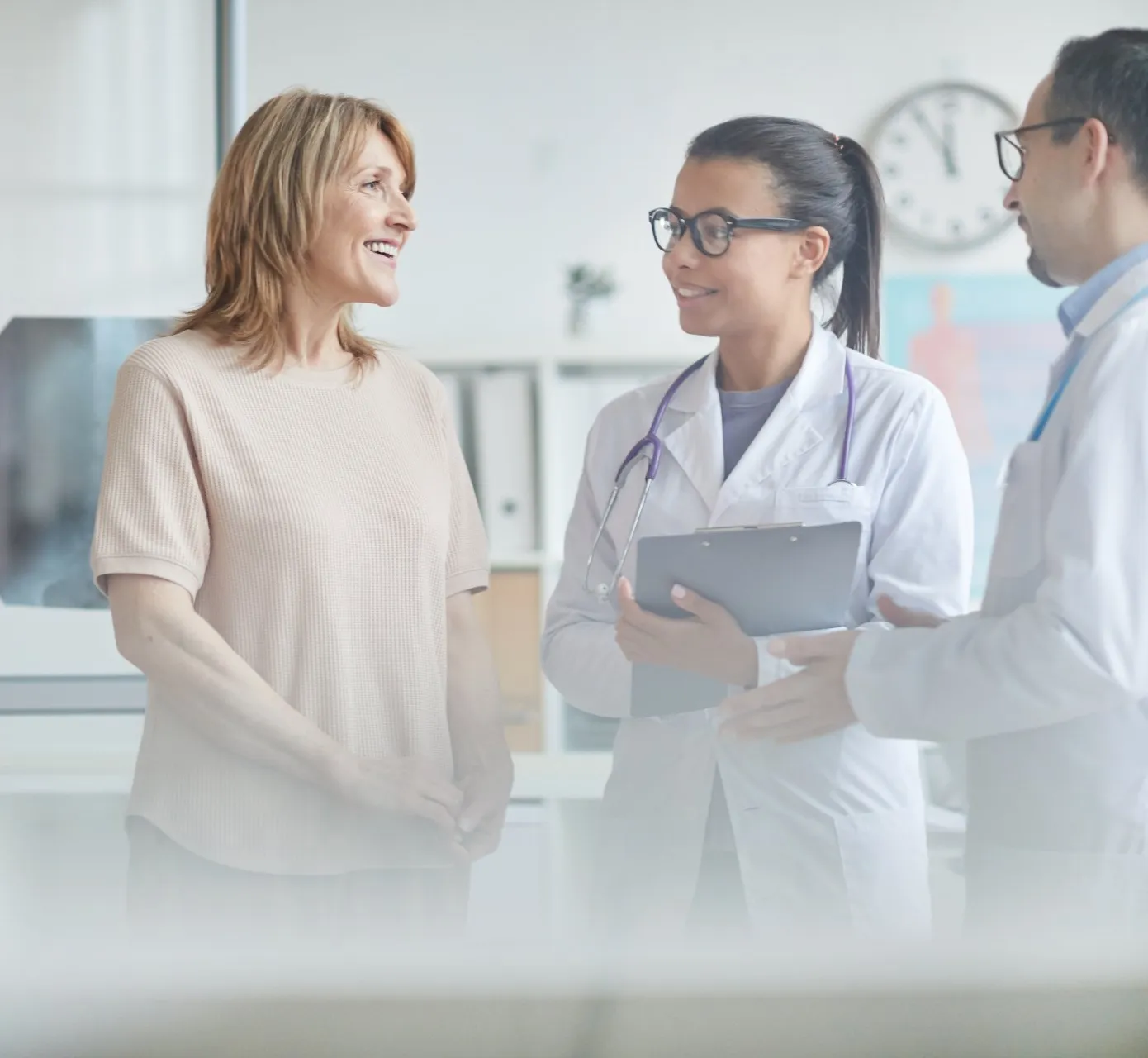 A patient talking with their care team